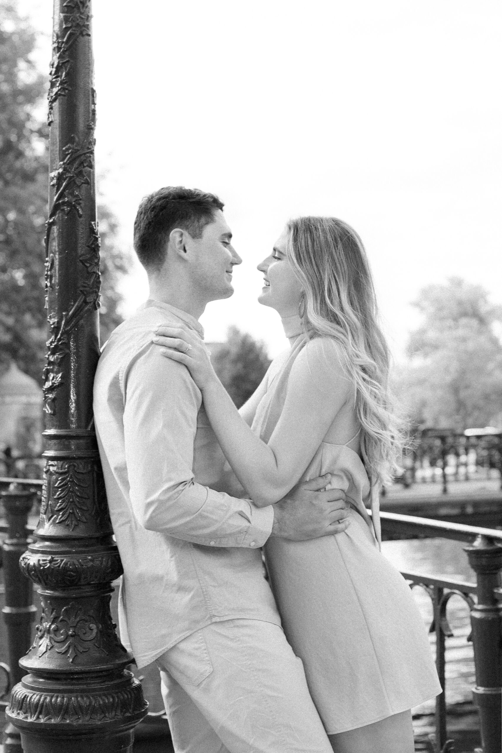 Couple Photoshoot in Amsterdam: A Romantic Escape Captured in Editorial Style 6 Couple looking at each other and leaning for a kiss