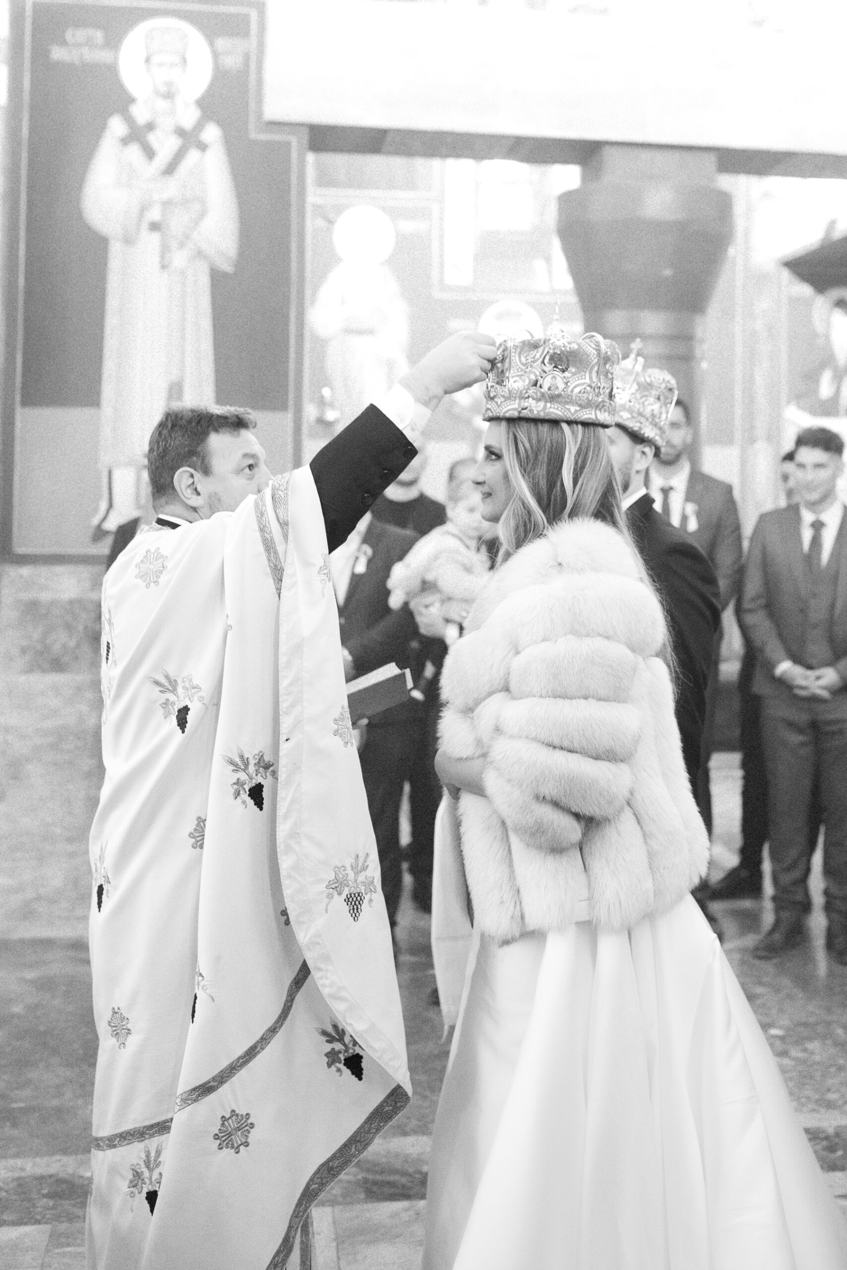 Belgrade Church Wedding at Orthodox Church of St. Luke the Apostle 3 Church wedding in Belgrade, Serbia, captured in the style of analog black and white photography with an artistic touch.