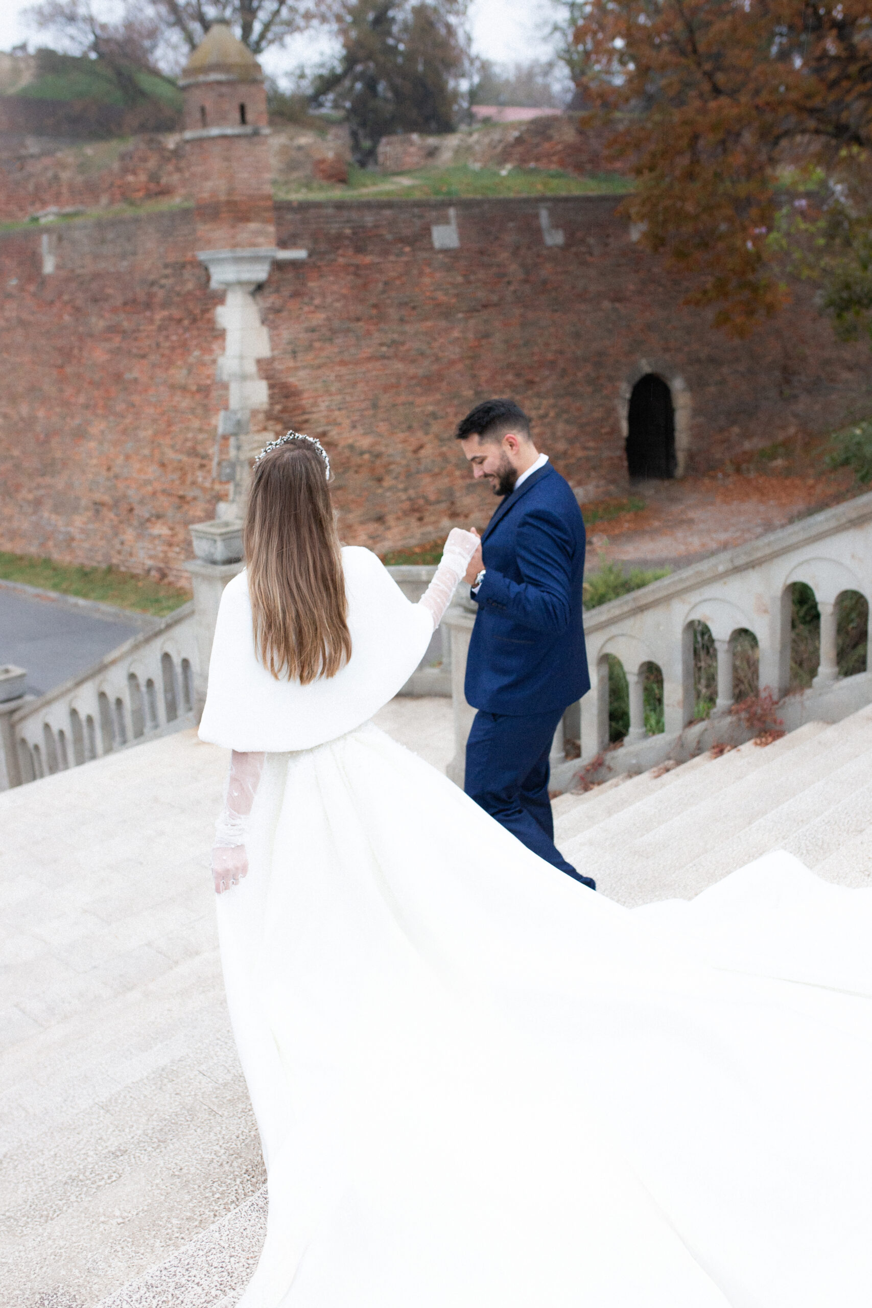 Belgrade Church Wedding at Orthodox Church of St. Luke the Apostle 14 Photo of the bride and groom on the Grand staircase of Kalemegdan Fortress in Belgrade, Serbia