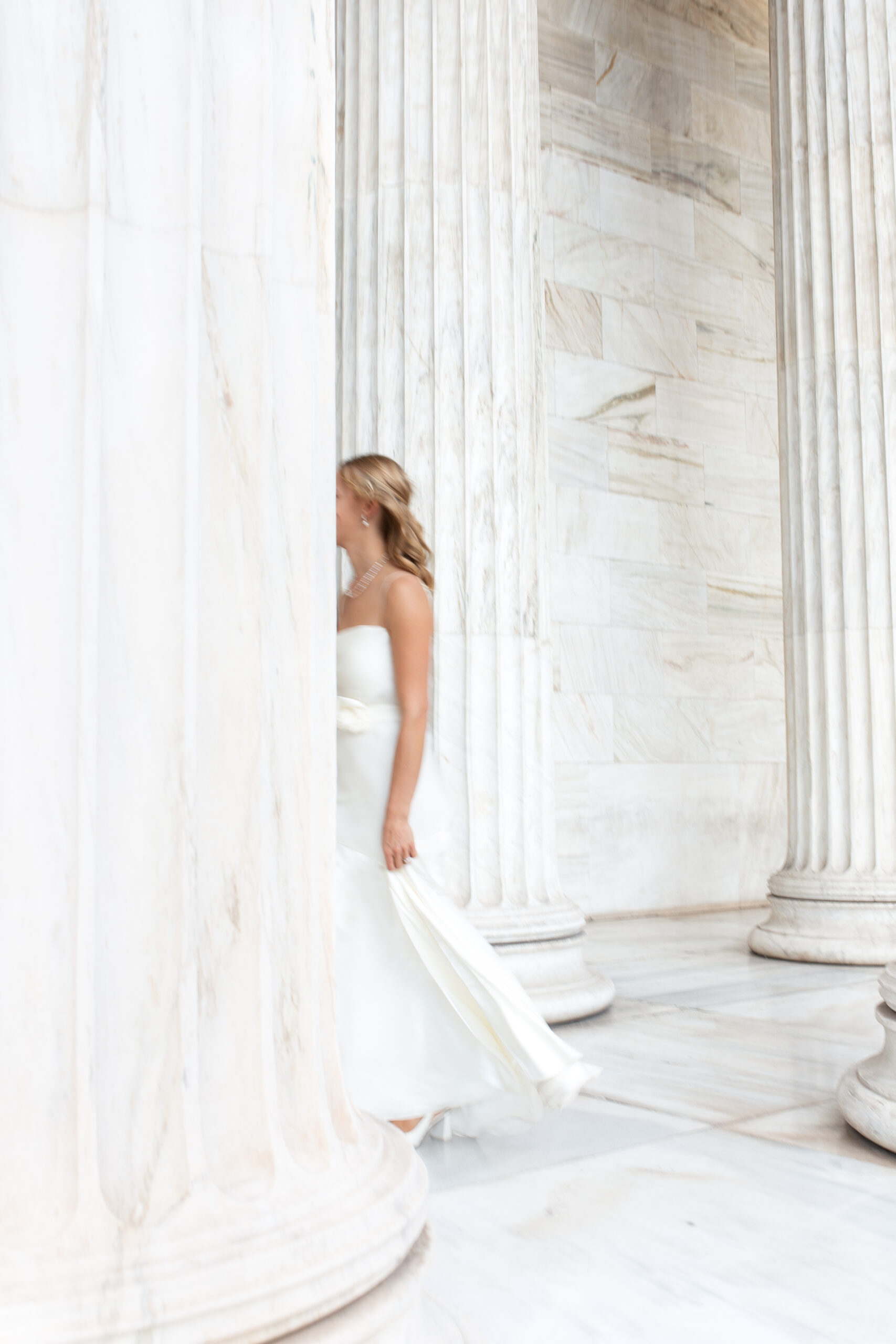 Editorial style photo of the bride walking, captured with motion blur - Athens, Greece