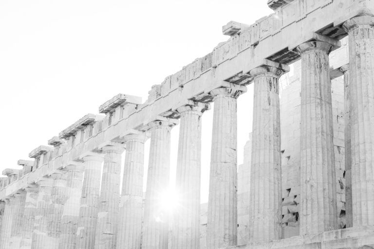 The Acropolis of Athens - sunrise captured between the columns of the Parthenon temple